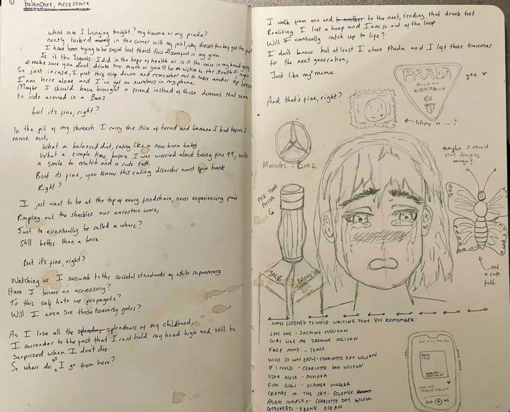 Images shows a notebook with song lyrics and drawings
